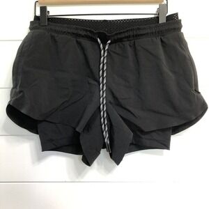 Athleta Women's Crest 2 In 1 Shortie Size 4 Black Elastic Waist Tie Lined Active